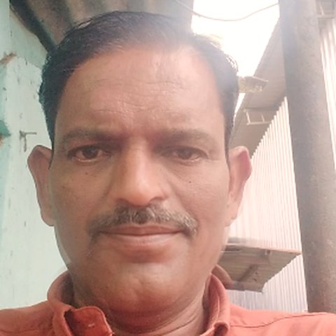 Photograph of the timber business owner.